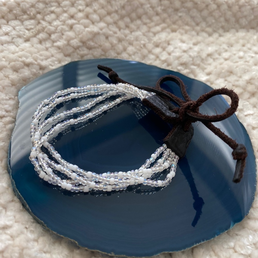 Multi-Strand White Beaded Bracelet With Leather